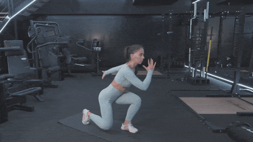 Вправа - Зворотній випад з підніманням коліна