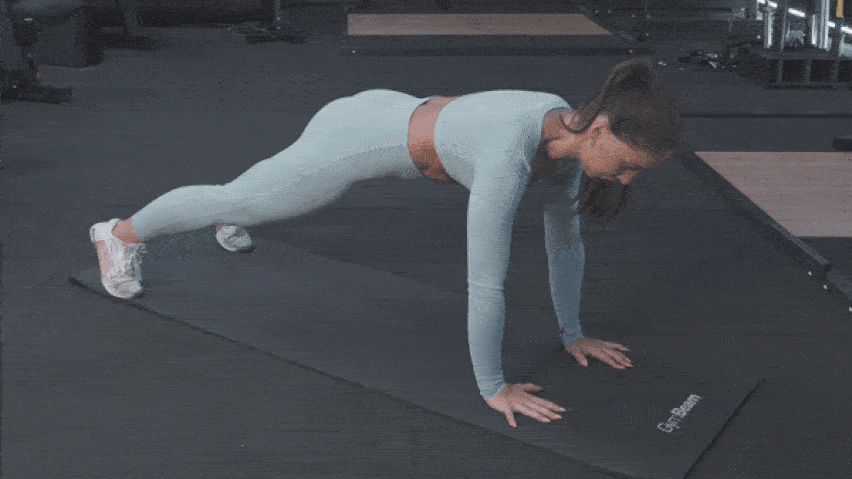 Вправа - торкання плеча в планці